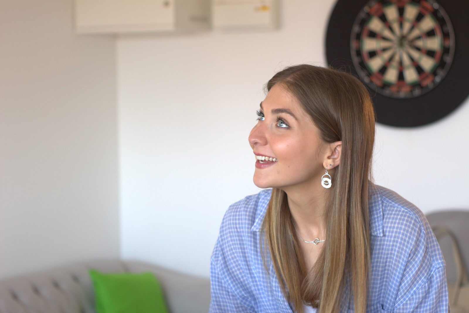 Izzy — newly joined full-time Content Creator at Compelite Pro, smiling in the studio