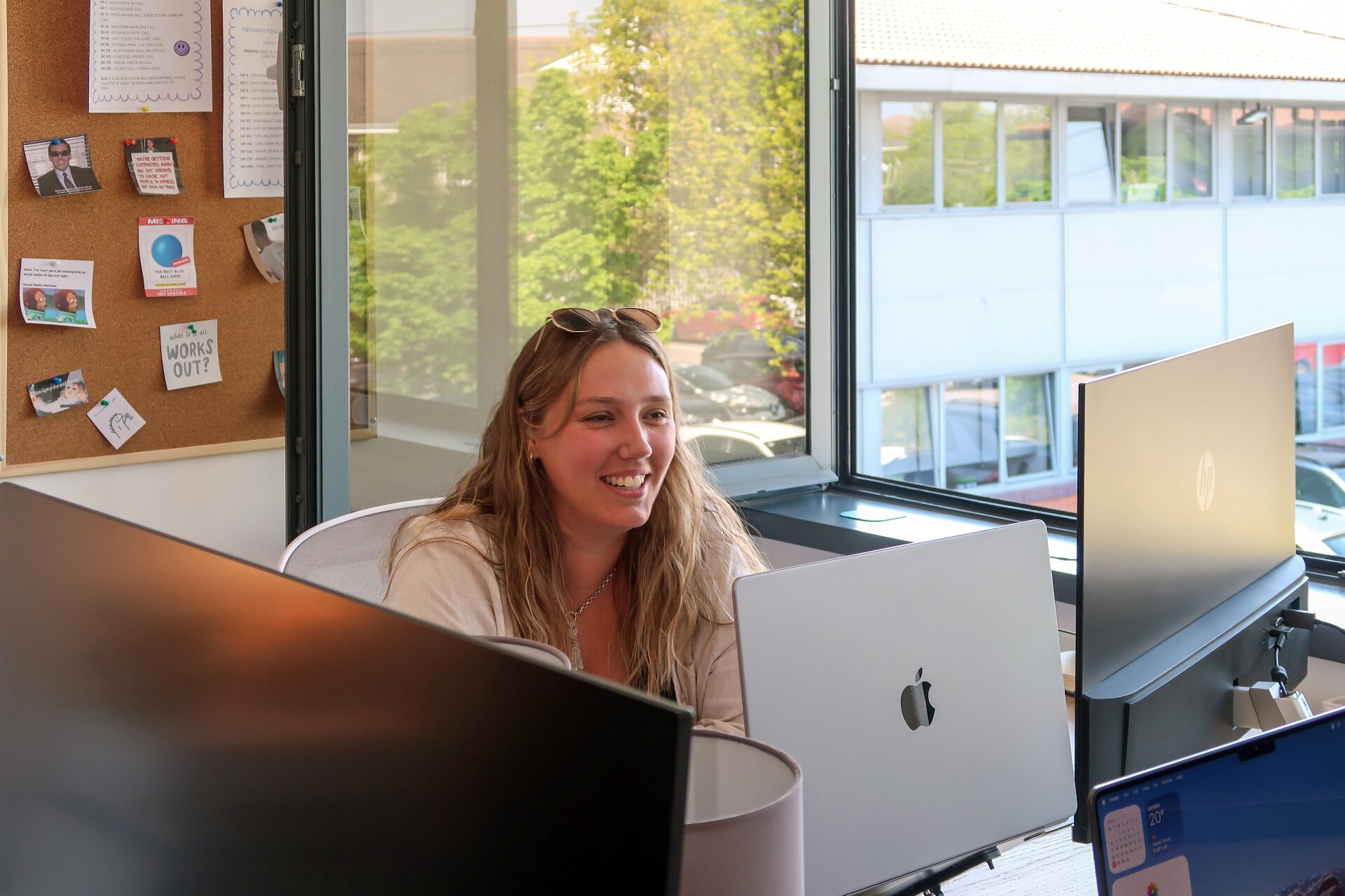 Compelite Pro team member working on branded client content
