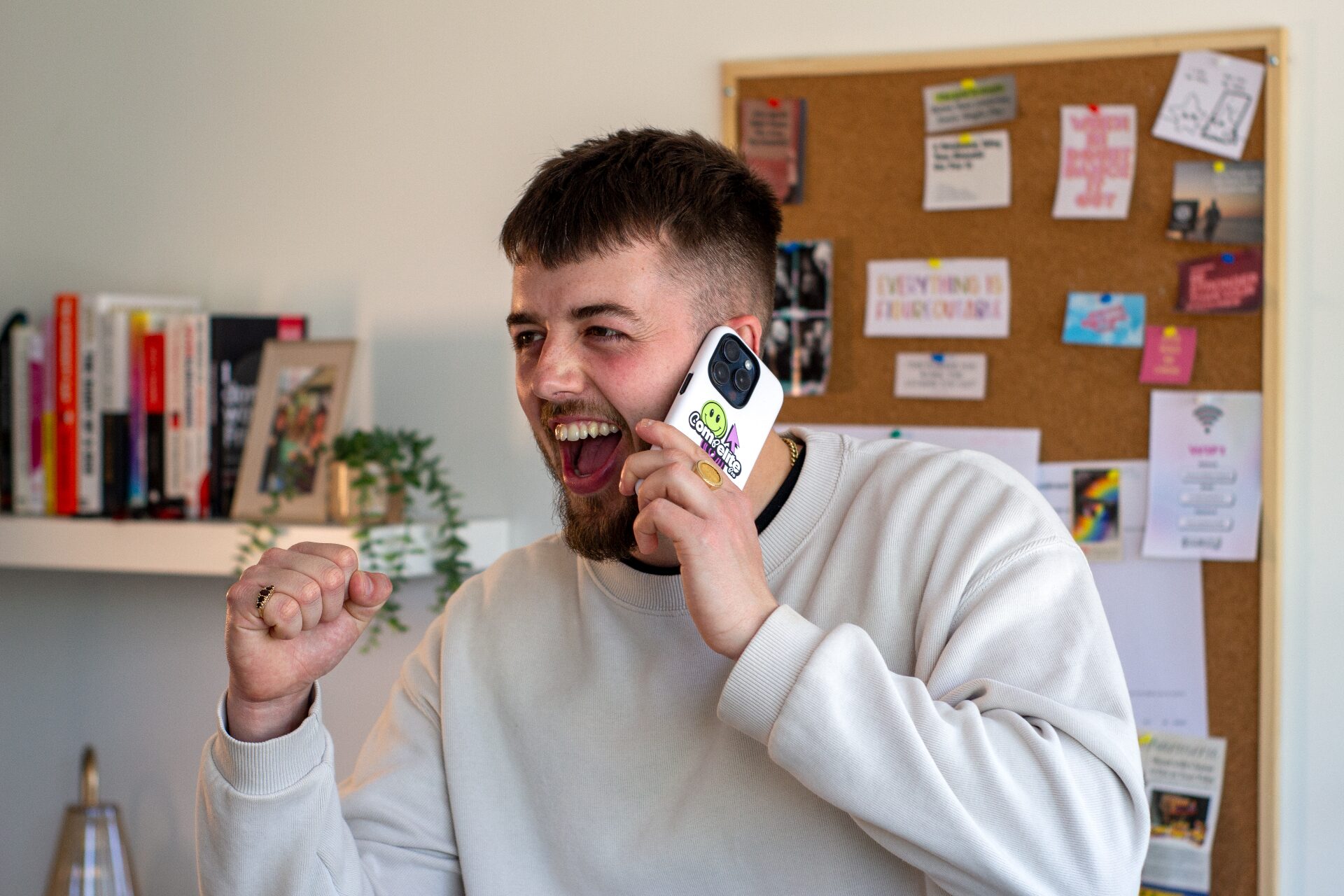 Compelite Pro team member celebrating on the phone — free downloads, guides and templates
