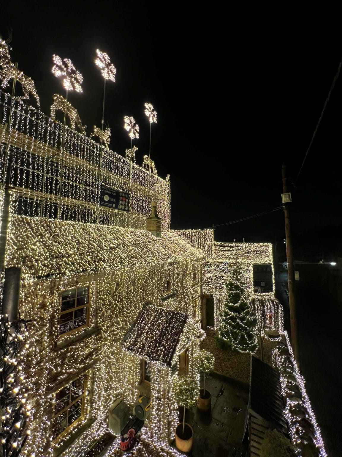 Winterbourne Down Lights — a house covered in thousands of warm white Christmas lights raising money for charity in South Gloucestershire