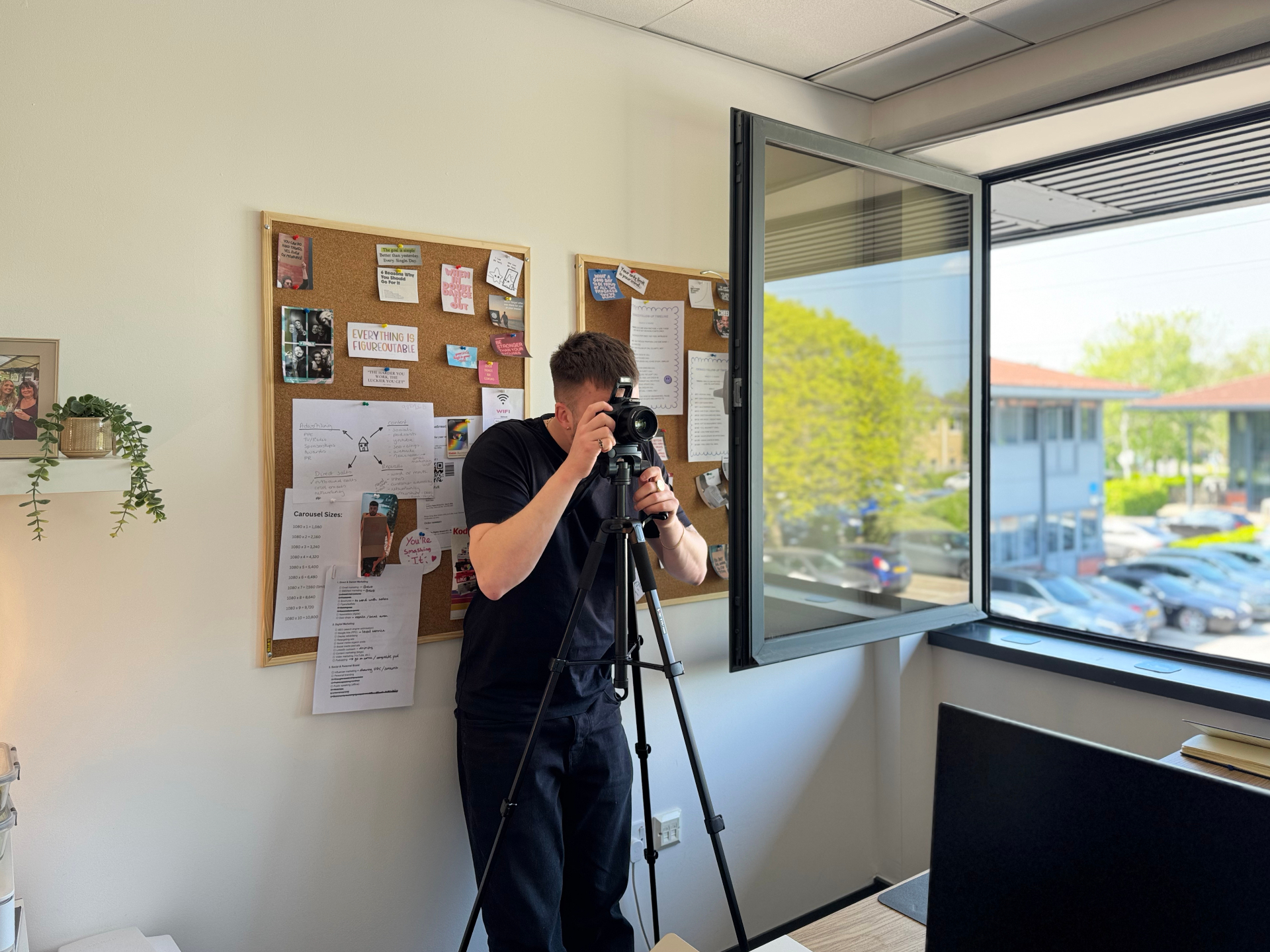 Compelite Pro content creator filming behind the scenes for a Window Cleaners client